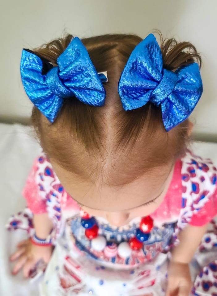 Metallic Blue Bow & Accessory Fabric
